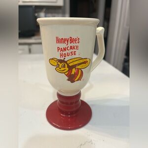 Cream Plastic Pedestal Mug with Red Base